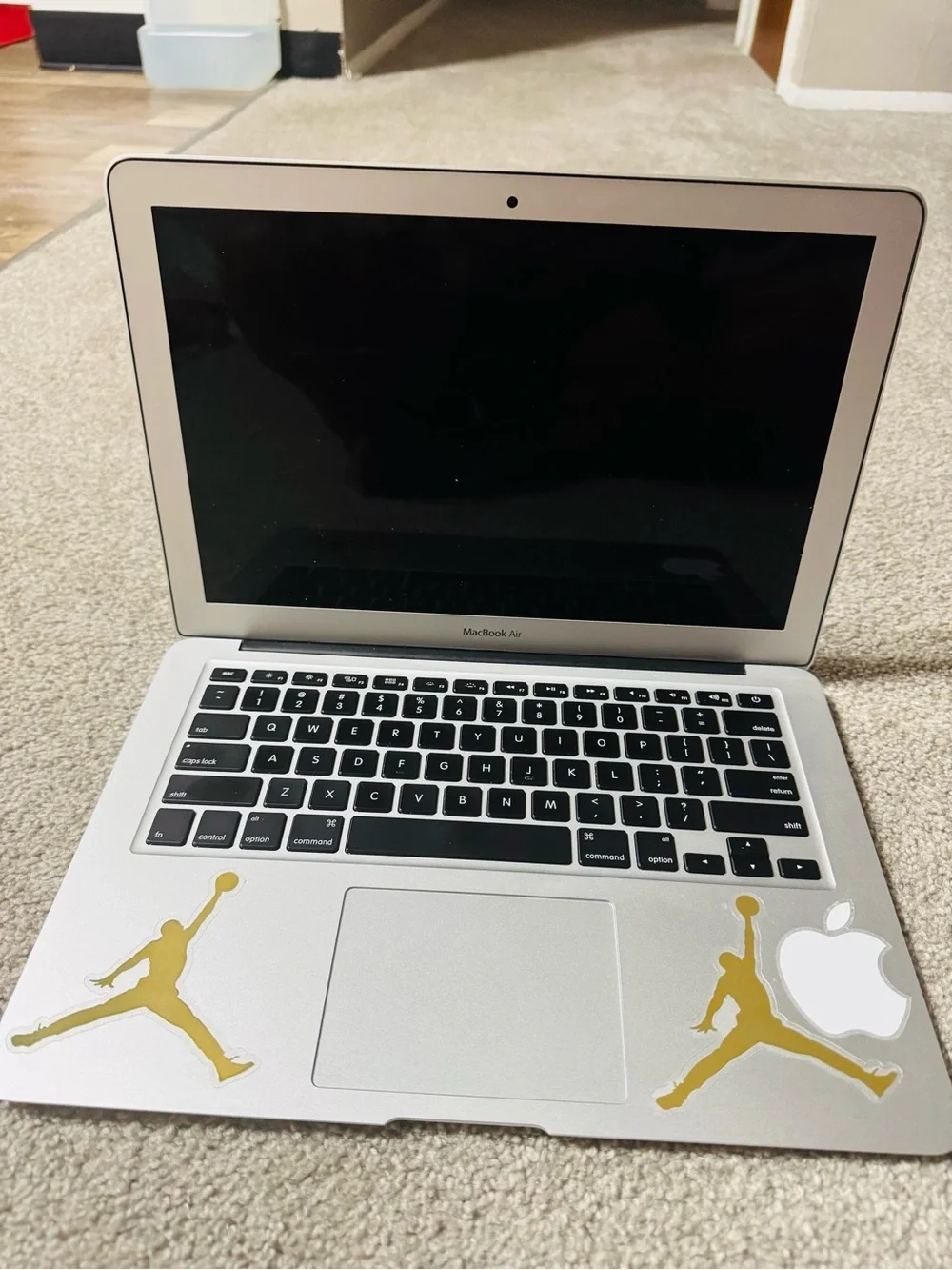 Apple Silver MacBook Laptop with Apple Logo